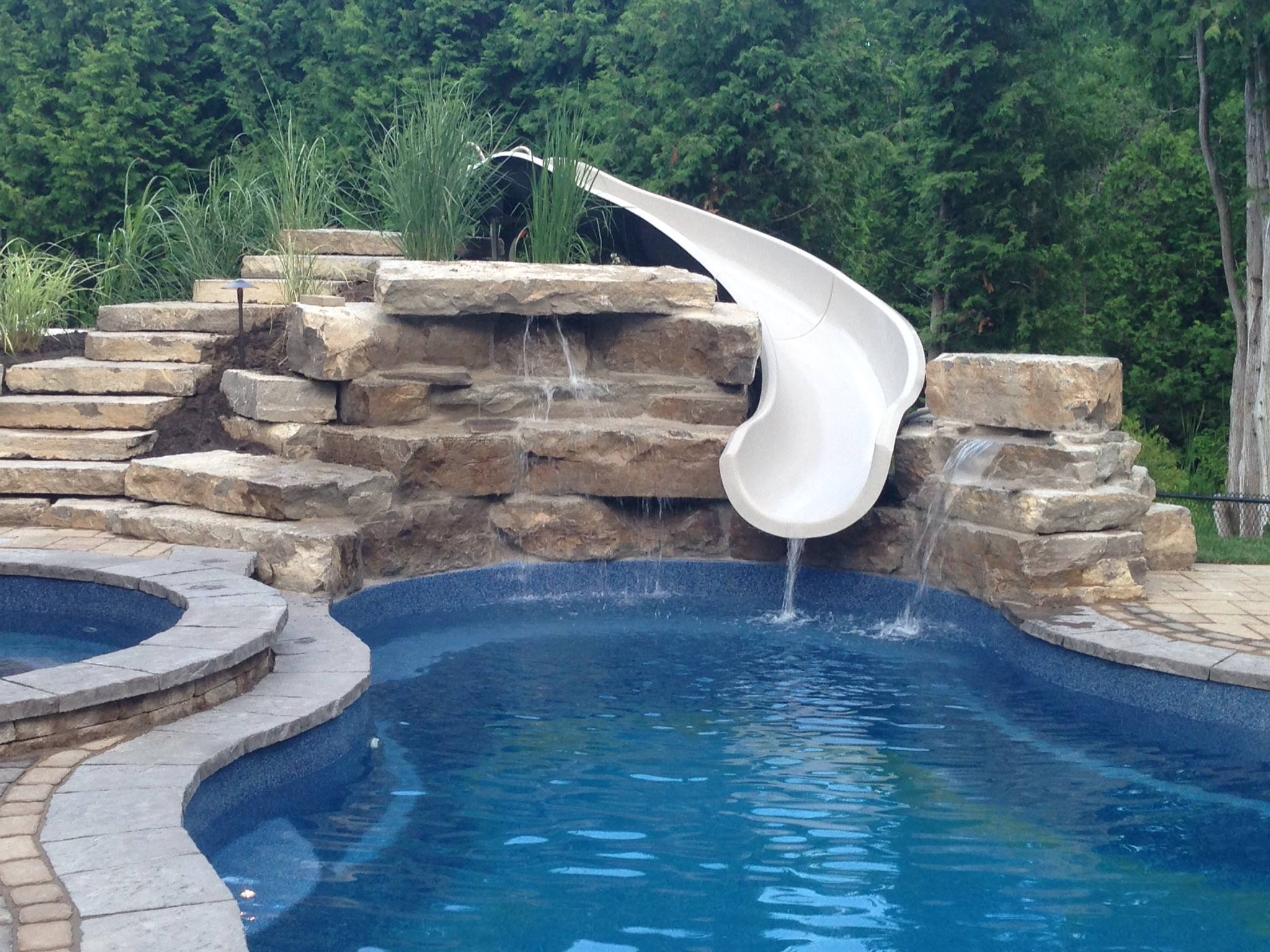 Fiberglass pool with a slide in Barrie, Ontario