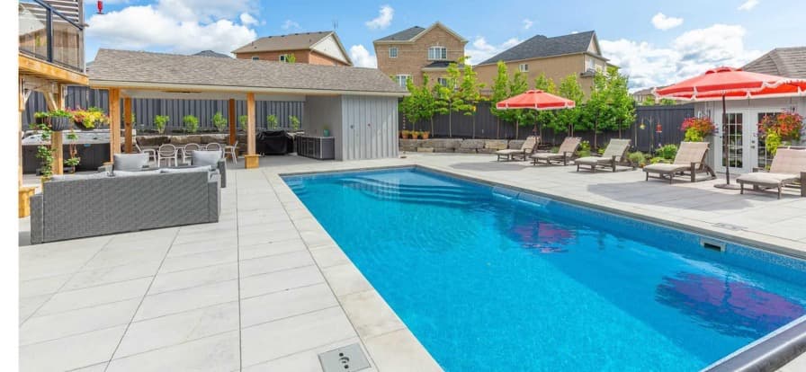 Fiberglass pool with a beautiful patio